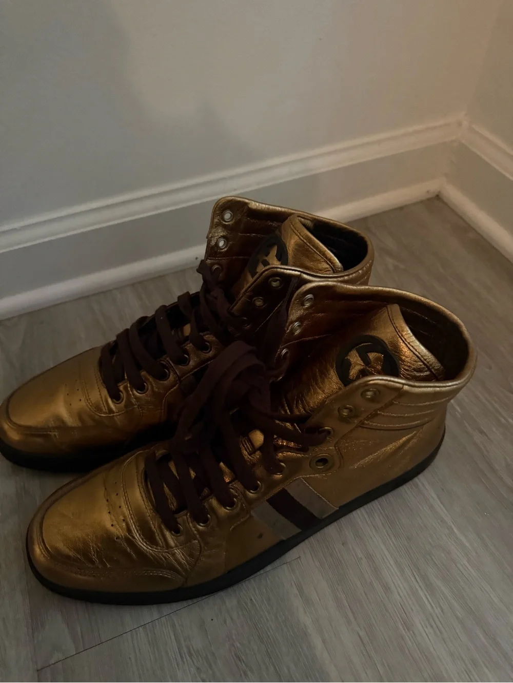 Gucci Metallic Gold High-Top Sneakers with Black Logo